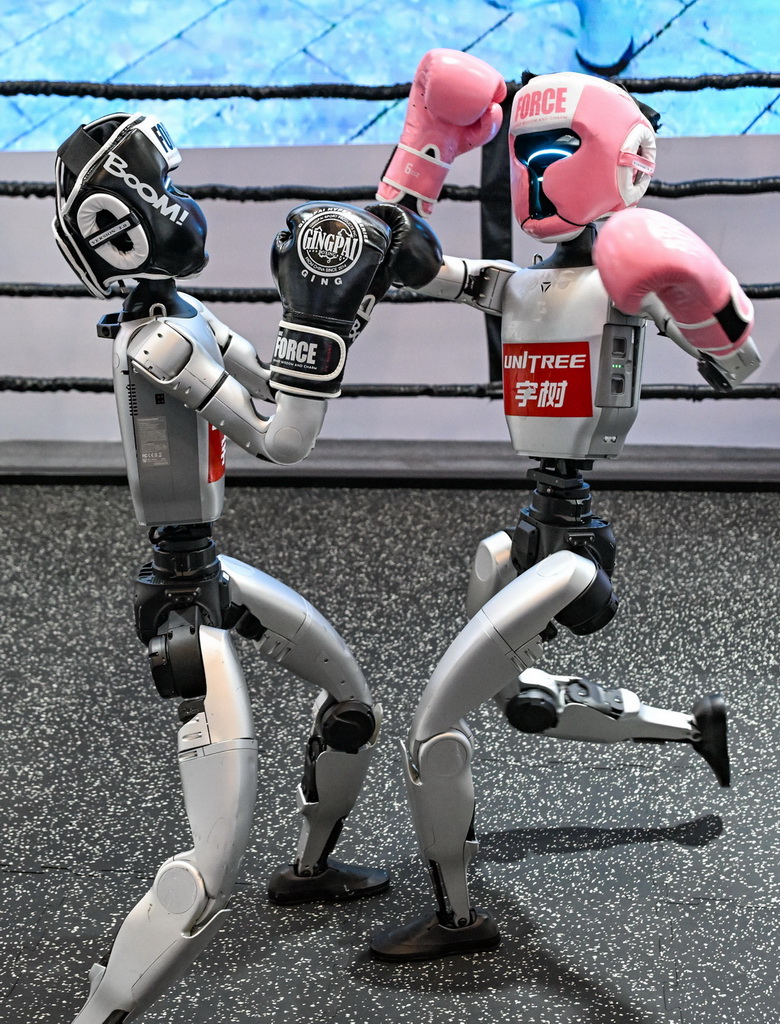 这是9月4日在2025世界智能产业博览会宇树科技展厅拍摄的机器人拳击赛现场。新华社记者 王全超 摄