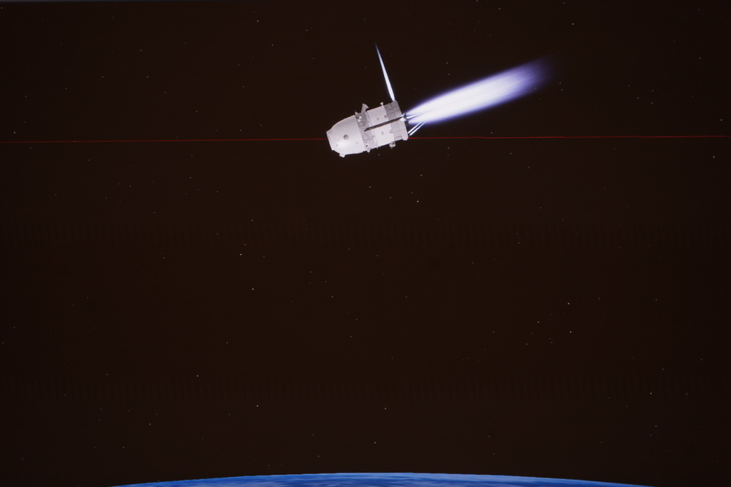 1月19日在北京航天飞行控制中心拍摄的神舟二十号飞船发动机制动的模拟画面。新华社记者 王春涛 摄