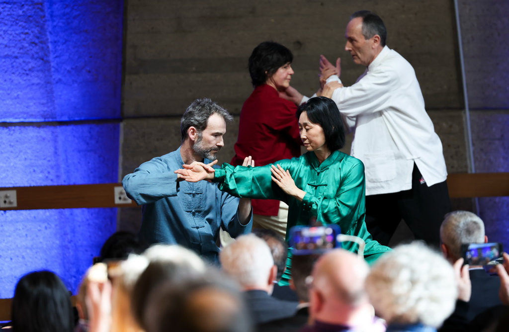 3月18日，太极拳习练者在活动上表演。